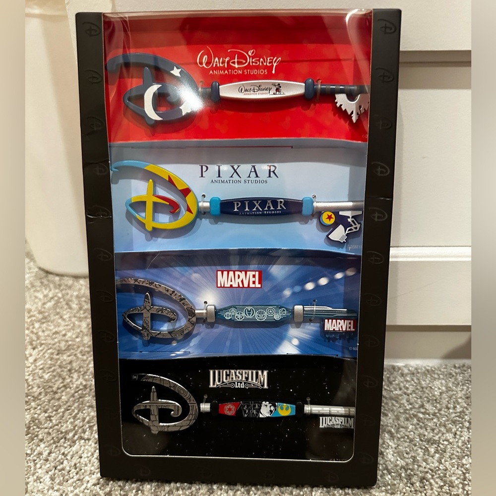 NWT- Disney Collectible Key Set of 4 Starter Key Collection Pixar, Marvel, Lucas
